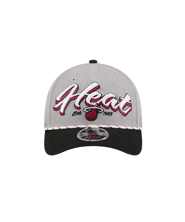 The New Era Miami HEAT Loyal Team Snapback is a gray and black cap featuring the Miami Heat logo and 