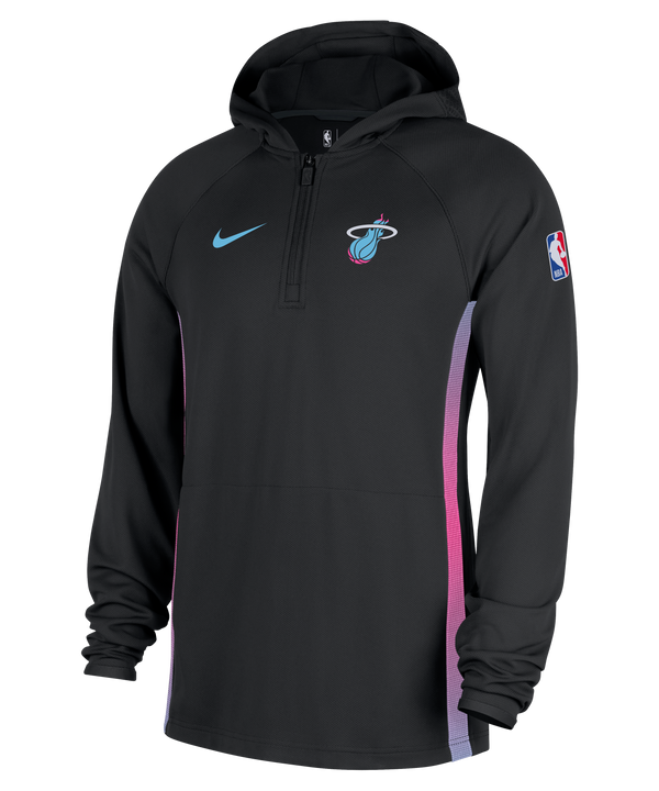 The Nike Miami HEAT Original Vice Nights 1/2 Zip Hoodie is a black Nike pullover with a blue logo, Heat chest logo, NBA sleeve patch, and pink-blue gradient side panels.