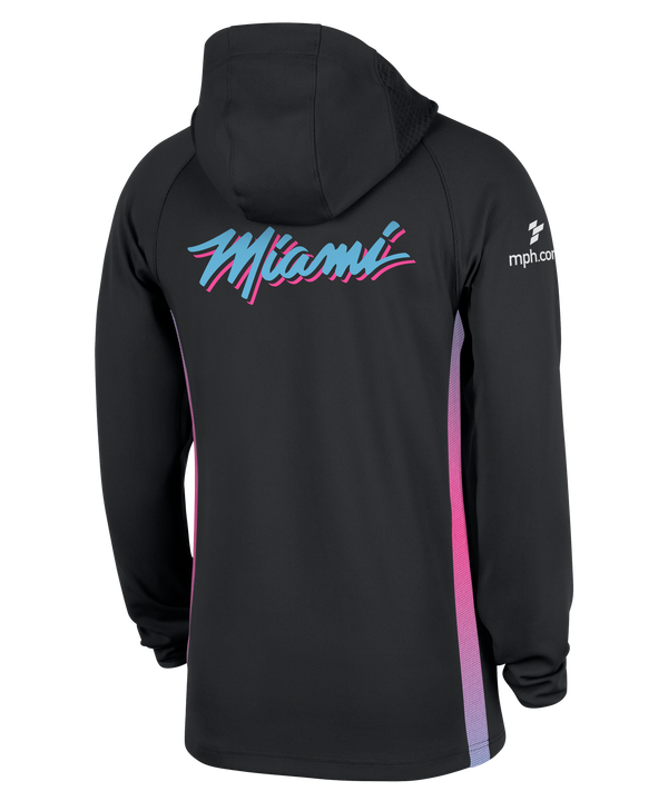 The Nike Miami HEAT Original Vice Nights 1/2 Zip Hoodie is a black Nike pullover with a blue logo, Heat chest logo, NBA sleeve patch, and pink-blue gradient side panels.