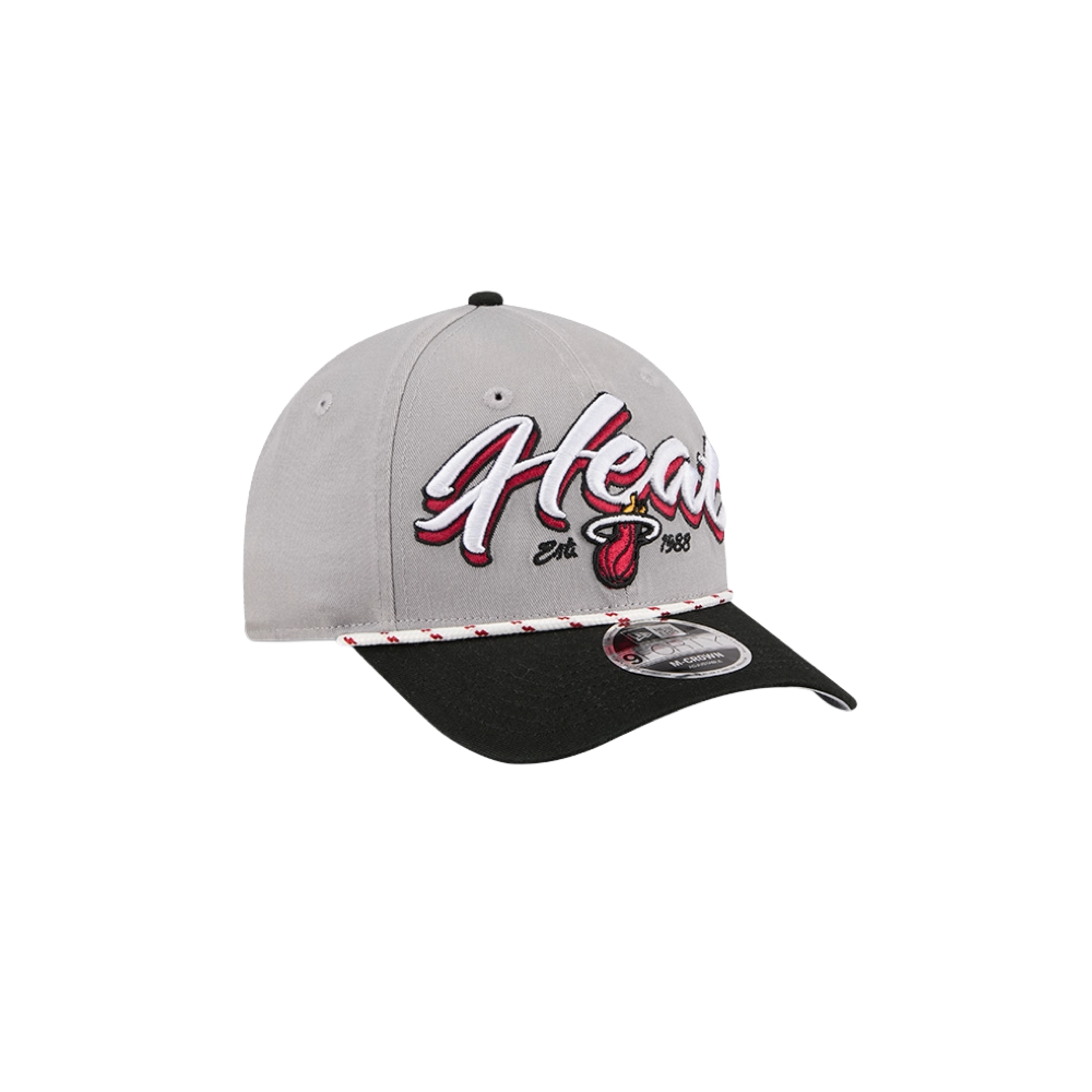 The New Era Miami HEAT Loyal Team Snapback is a gray and black cap featuring the Miami Heat logo and 