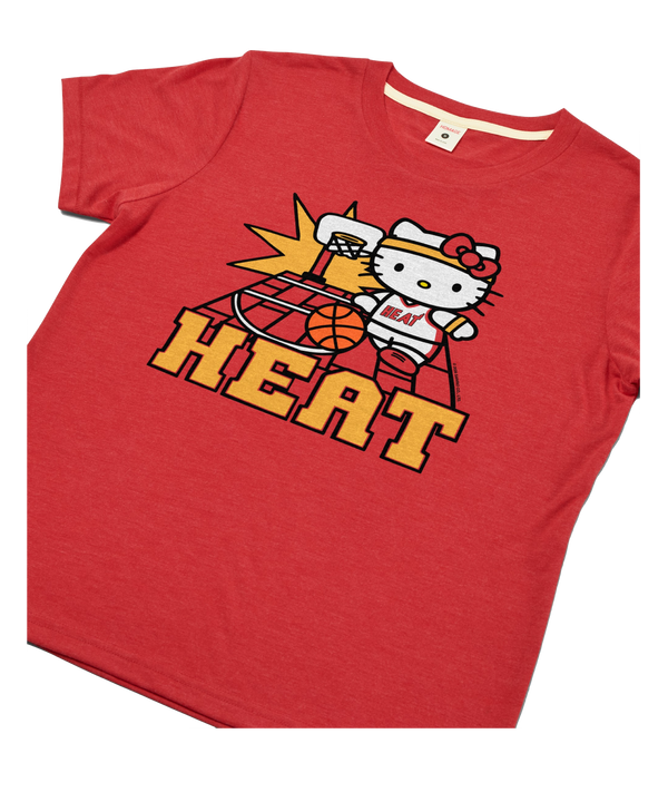 Homage Miami HEAT Hello Kitty Basketball Women’s Tee: red polyester-cotton crew neck t-shirt featuring a graphic of Hello Kitty wearing a basketball uniform on a court, with the word HEAT printed below.