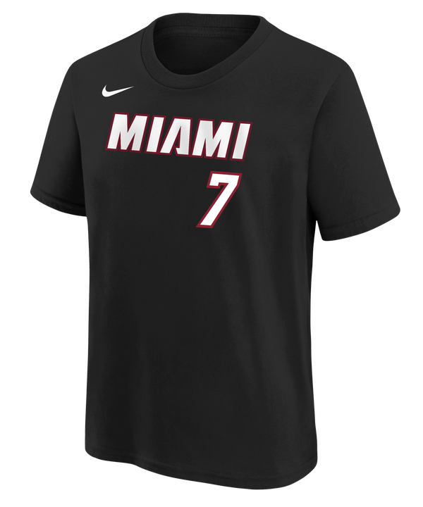 The Nike Giannis Antetokounmpo Icon Black Name & Number Youth Tee features short sleeves and MIAMI boldly printed in white and red above the number 7 on the front, along with a white Nike logo on the upper left. Made from 100% cotton with a standard fit, this tee is easy to care for—just machine wash cold.