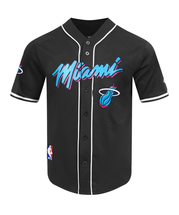 The Pro Standard Miami HEAT Original Vice Nights Baseball Jersey features “Miami” in blue and pink script, white trim, black buttons, NBA patch, and standard polyester fit. Easy care and machine washable. Brand: Pro Standard.