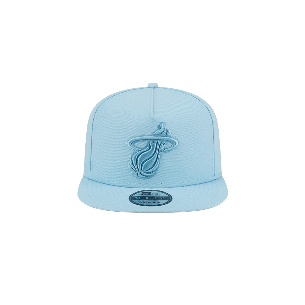 The New Era Miami HEAT Light Blue Color Pack Snapback features a light blue polyester A-Frame design with an embroidered Miami Heat logo. One size fits most. Spot clean only. Brand: New Era. Displayed on a plain white background.