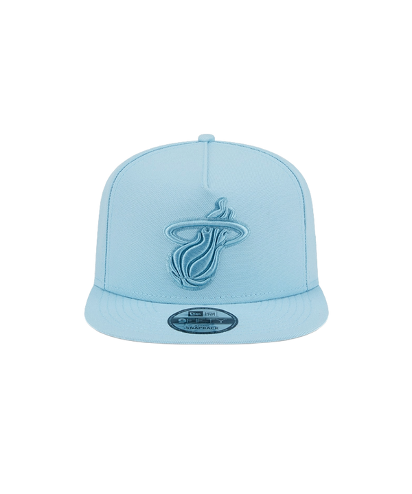The New Era Miami HEAT Light Blue Color Pack Snapback features a light blue polyester A-Frame design with an embroidered Miami Heat logo. One size fits most. Spot clean only. Brand: New Era. Displayed on a plain white background.