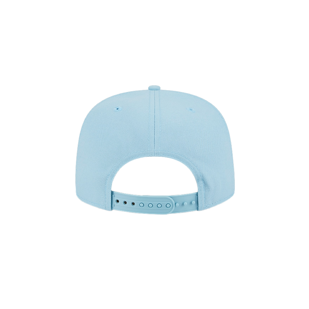 The New Era Miami HEAT Light Blue Color Pack Snapback is a polyester cap in light blue, shown from the back with an adjustable snapback closure. One size fits most; spot clean only. The design is plain with no visible logos or designs.