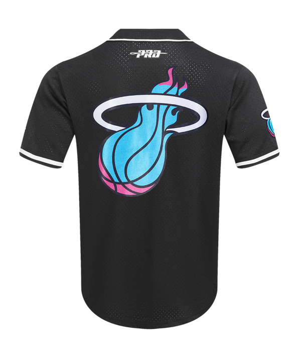 The Pro Standard Miami HEAT Original Vice Nights Baseball Jersey features “Miami” in blue and pink script, white trim, black buttons, NBA patch, and standard polyester fit. Easy care and machine washable. Brand: Pro Standard.