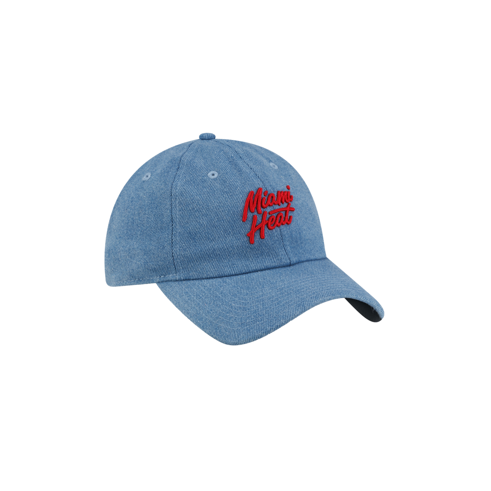 Court Culture x New Era Retro Denim Dad Hat: A blue denim baseball cap with Miami Heat embroidered in red script on the front, featuring a one size fits most design.