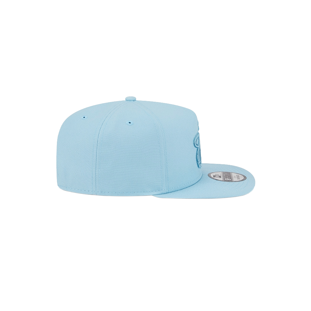 The New Era Miami HEAT Light Blue Color Pack Snapback is a polyester A-Frame hat, shown from the back and side with a round brim sticker and subtle stitching. One size fits most. Set on a white background. Spot clean only.
