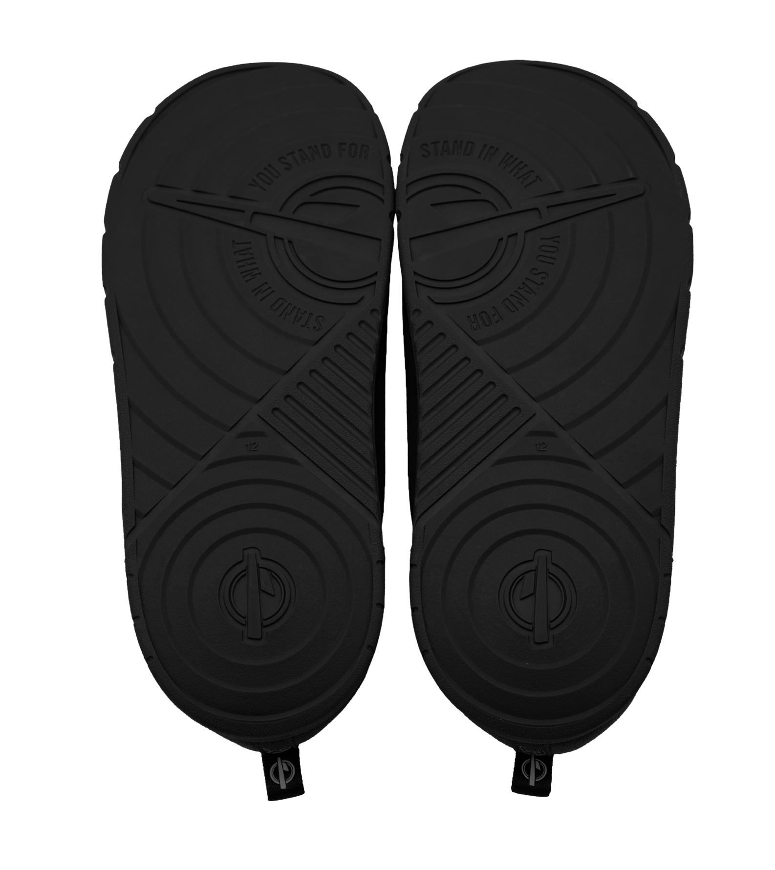 Bottom view of two black ISlide Miami HEAT Original Vice Nights Mission Slipper sandals featuring concentric circles and the embossed text STAND IN WHAT YOU STAND FOR.