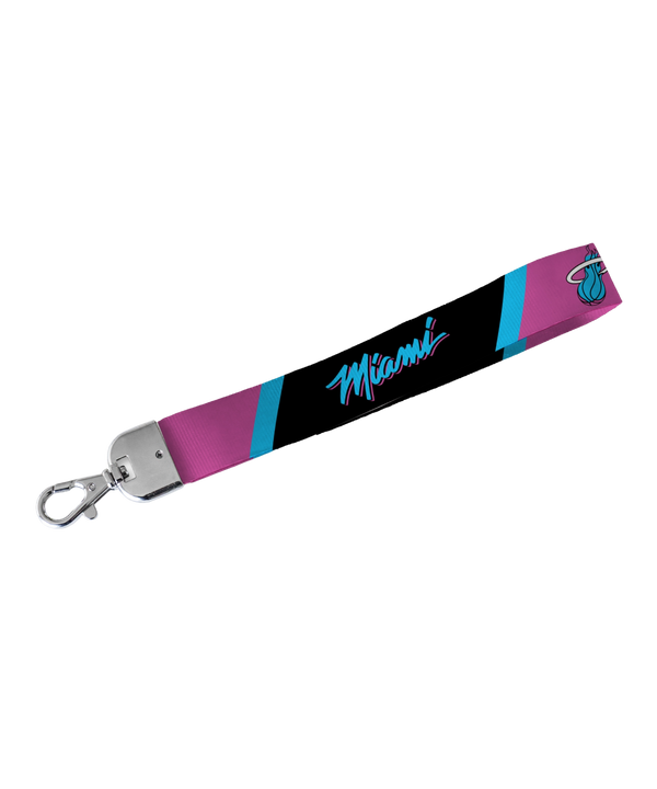 The Miami HEAT Original Vice Nights Lanyard Keychain by Rico Industries is officially licensed, 9 inches long, and features a pink, black, and teal design with 