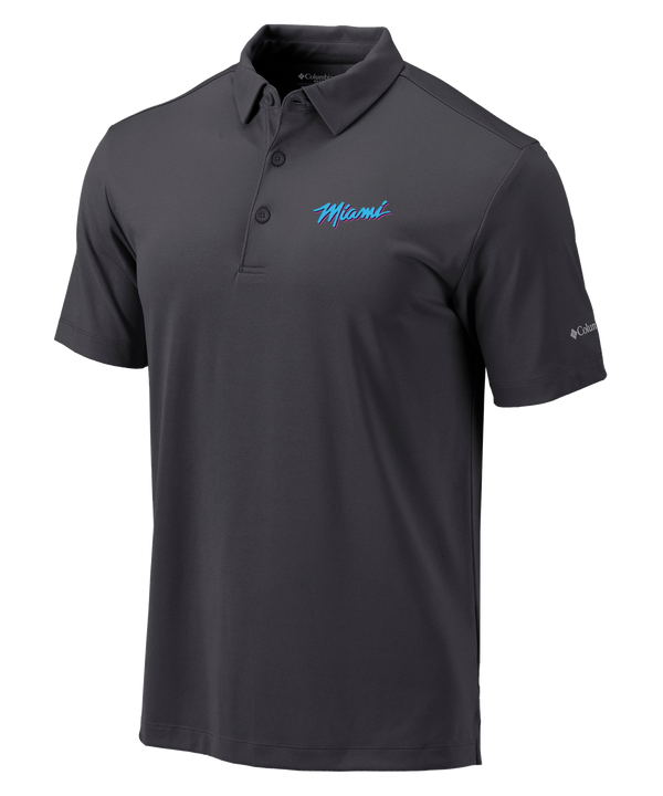 The Columbia Miami HEAT Original Vice Nights Drive Polo by Columbia Outdoor is a dark gray, standard fit, polyester short-sleeve polo with a collar and buttons, 