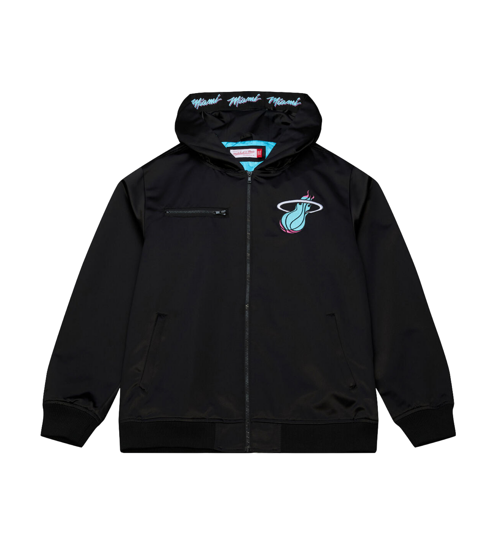 The Mitchell & Ness Miami HEAT Original Vice Nights Satin Bomber is a black zip-up jacket with hood, featuring teal and pink team logo on the chest and 