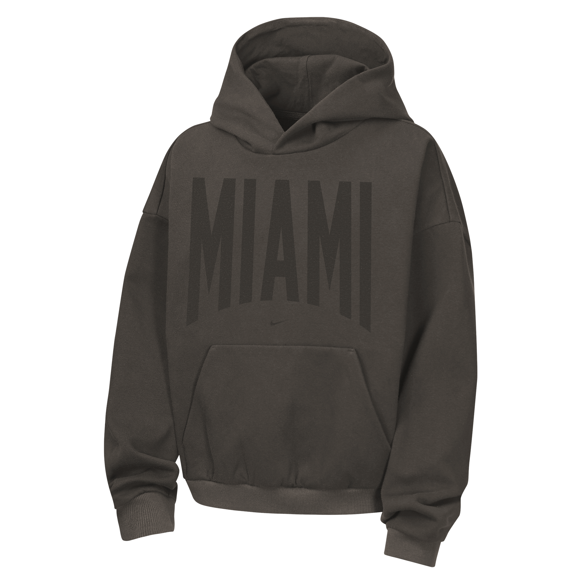 The Nike Miami HEAT Oversized Fleece Travel Youth Hoodie is a dark gray, loose-fit hoodie made from a soft cotton-polyester blend, featuring bold black “MIAMI” lettering across the chest and a convenient front kangaroo pocket.