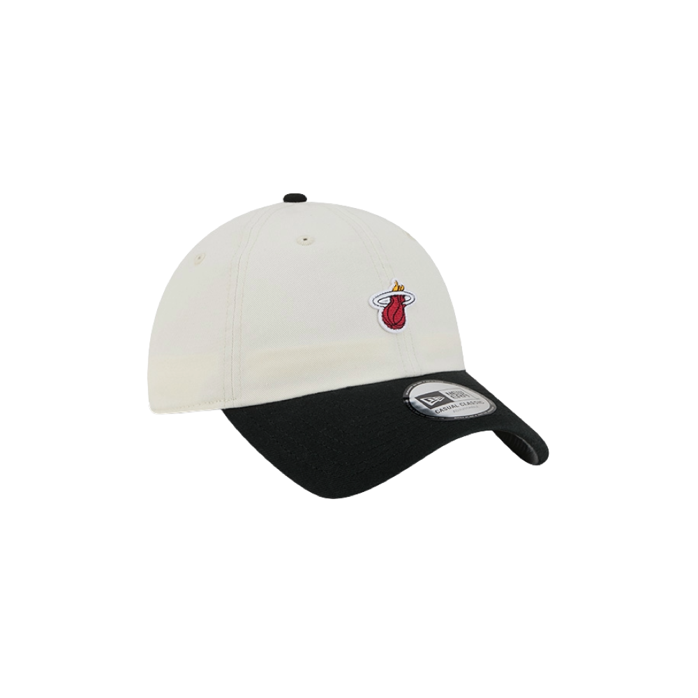The New Era Miami HEAT 2-Tone Micro Dad Hat features a casual, two-tone design with a white cotton crown, black brim, and a small Miami Heat logo on the front. The classic New Era sticker is displayed on the brim, and its one size fits most construction provides comfortable wear for fans.