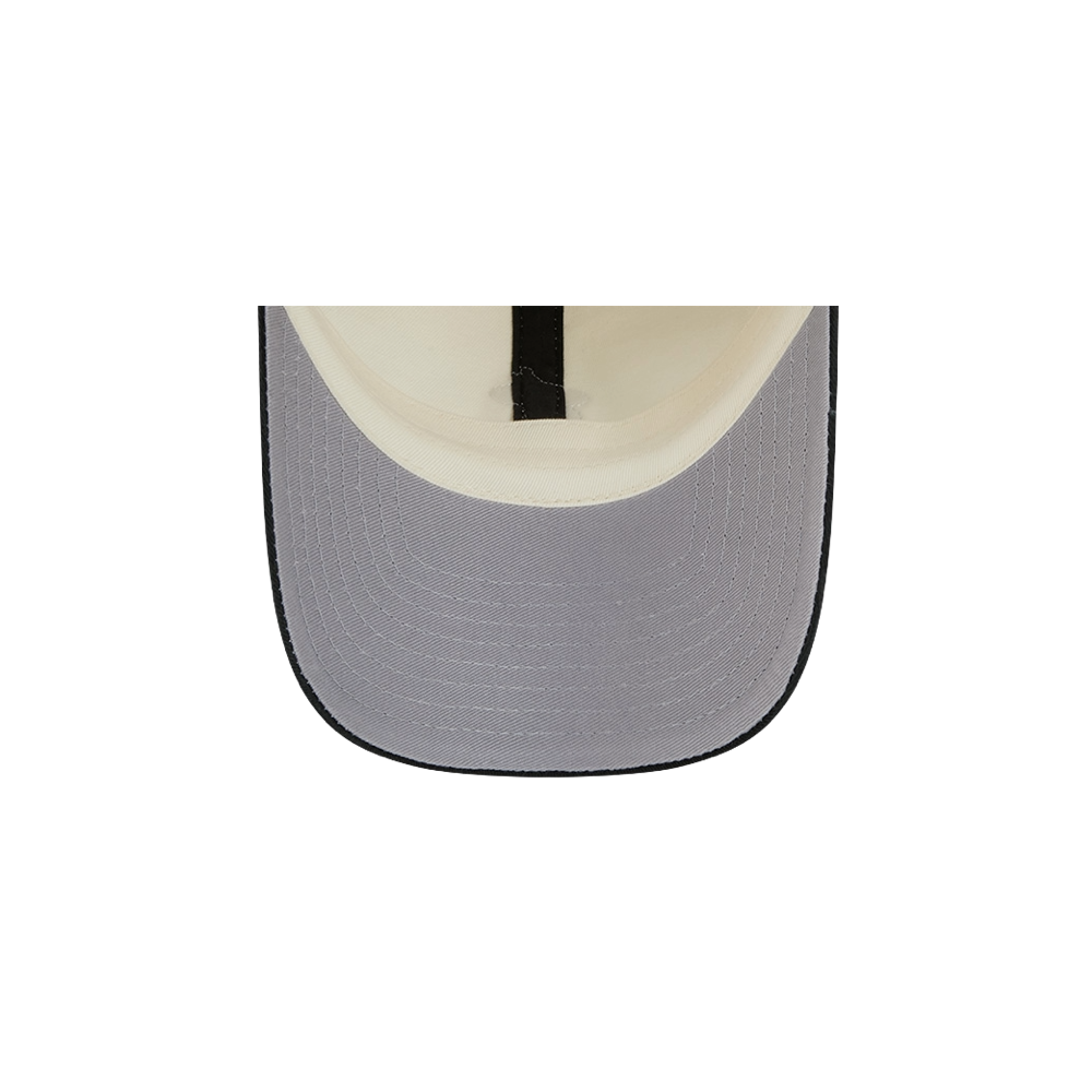 Top-down view of the inside of the New Era Miami HEAT 2-Tone Micro Dad Hat in cream and gray cotton, highlighting the curved brim and detailed interior stitching. This casual hat by New Era offers a comfortable design with a one size fits most construction.