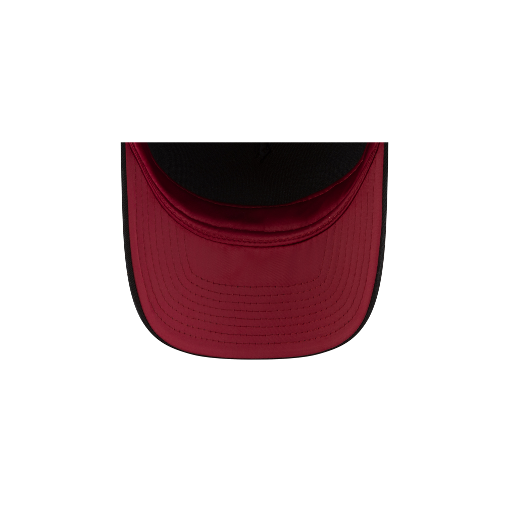 Top view of the New Era Miami HEAT Metallic Women's Hat, featuring a red brim with black edging in the 9FORTY M-Crown style by New Era, set against a plain white background.