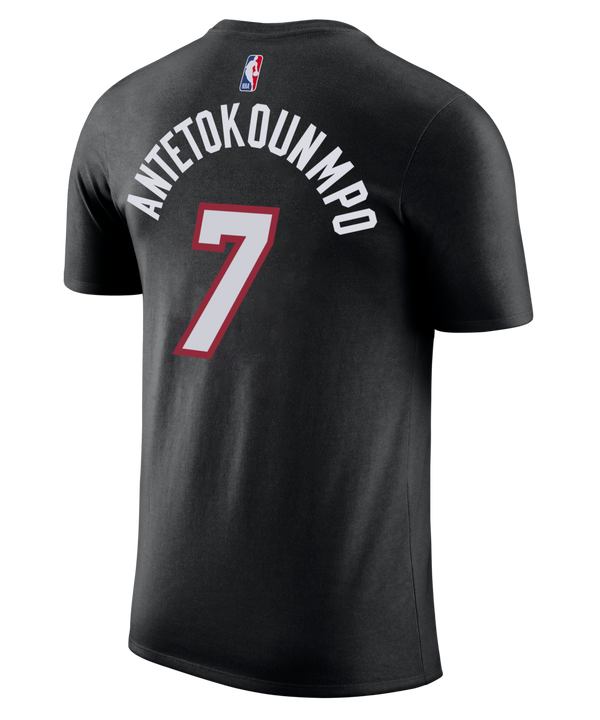 Introducing the Giannis Antetokounmpo Nike Miami HEAT Icon Black Name & Number Tee: this black T-shirt features bold “MIAMI” lettering in white and red with the number 7 displayed below. The Nike and NBA logos are visible near the collar, all set against a plain background. Made from 100% cotton for ultimate comfort, this official Nike tee is now available for pre-order.