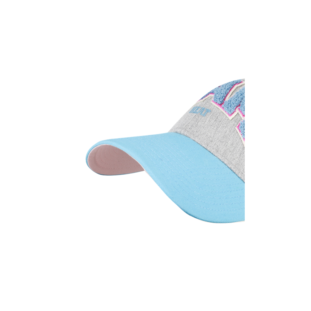 A close-up of the '47 Brand Miami HEAT Original Vice Nights MVP Dad Hat featuring a cotton front, light blue brim, pink underside, gray crown with vibrant embroidered lettering, and an acrylic back.