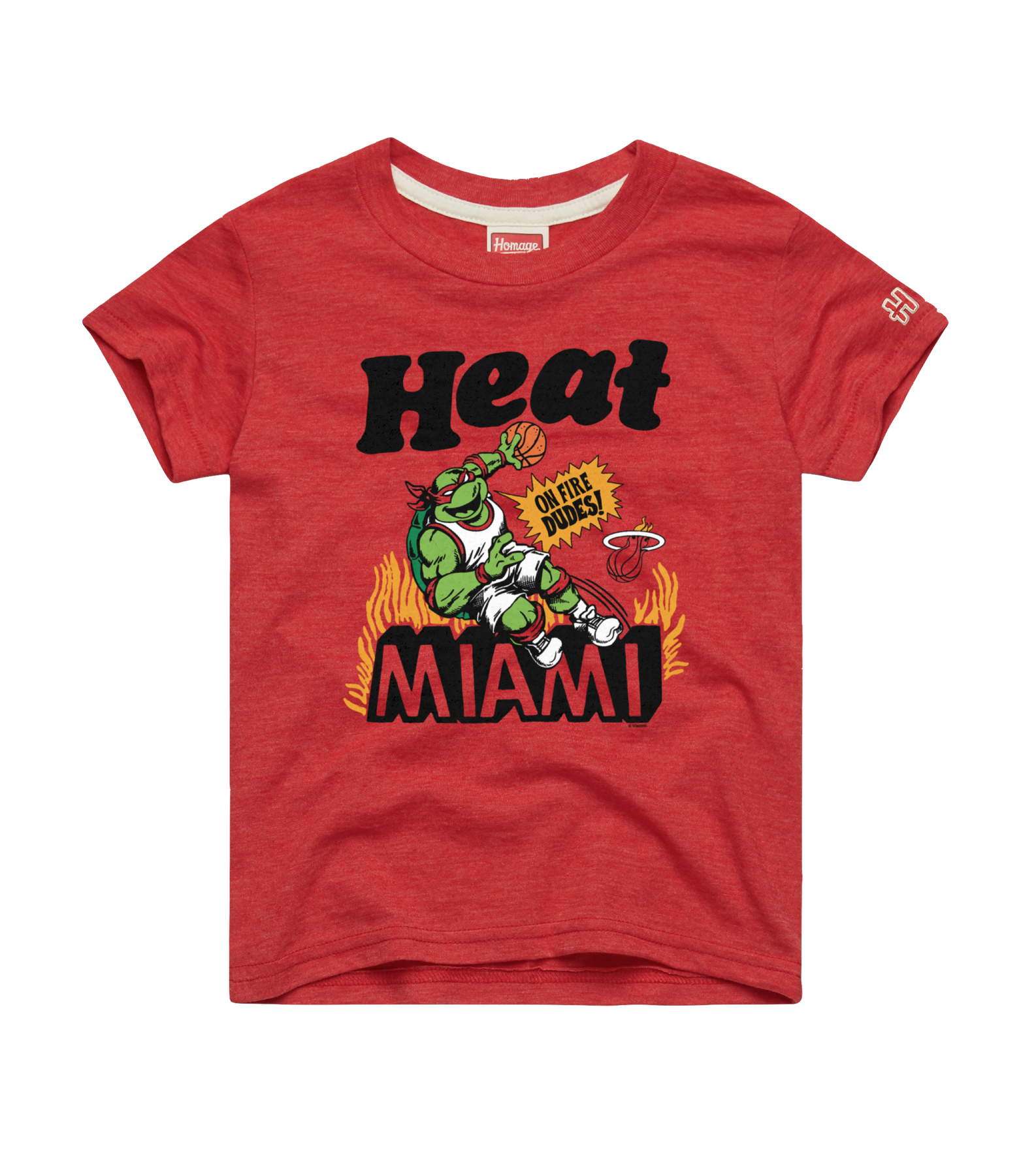 The Homage Miami HEAT Youth Red TMNT Tee by Homage features a cartoon green dragon mascot with sunglasses amid flames, holding a basketball. Made from polyester cotton rayon. “Heat MIAMI” and “Oh dude!” print. Machine wash cold recommended.