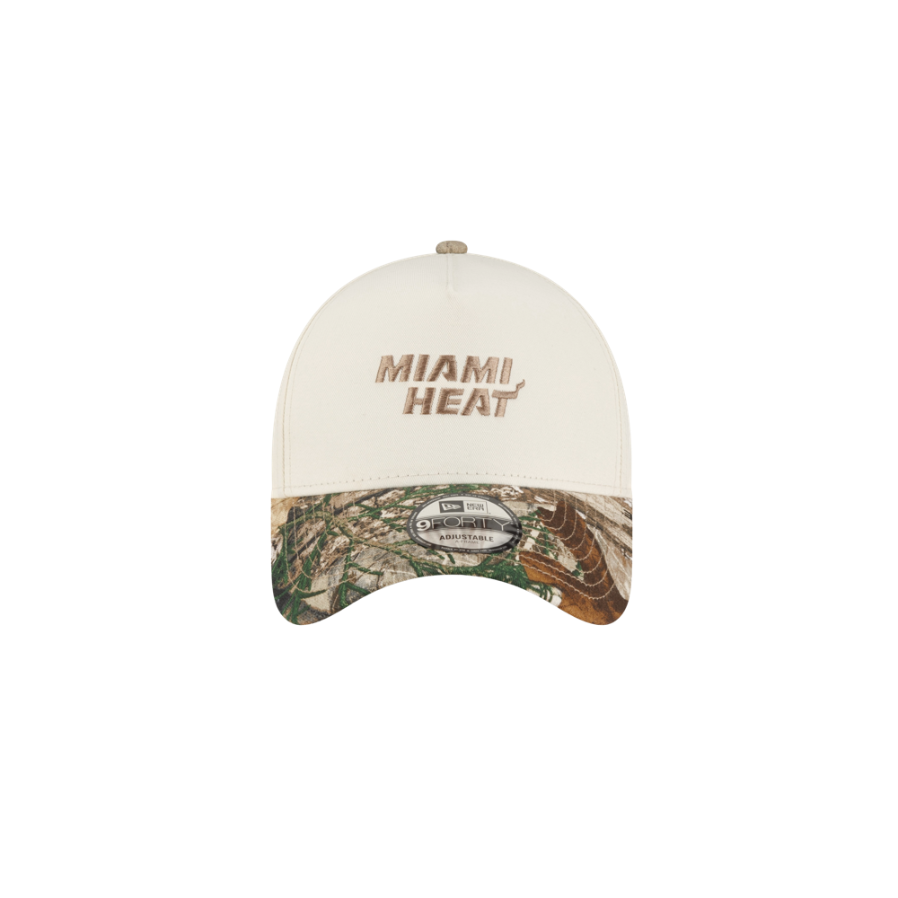 Court Culture x New Era Camo Brim Snapback: an off-white cotton baseball cap with Miami Heat embroidered on the front, a camouflage-patterned brim, and a one size fits most style.