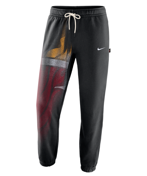 The Nike Miami HEAT Standard Issue Oversized Logo Fleece Pants feature a black design with a white drawstring and an elastic waistband. These pants showcase a large, colorful Miami HEAT basketball team logo on the left leg and a small white Nike Swoosh on the right thigh. Designed by Nike for a loose fit, they combine comfort and style for everyday wear.