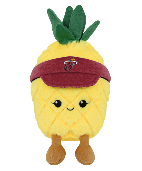 The Miami HEAT Pineapple Plushie by Forever Collectibles features a smiling face, brown legs, and a dark red visor with a flaming basketball logo. Filled with soft polyester fiber, it has green leaves and is surface washable.