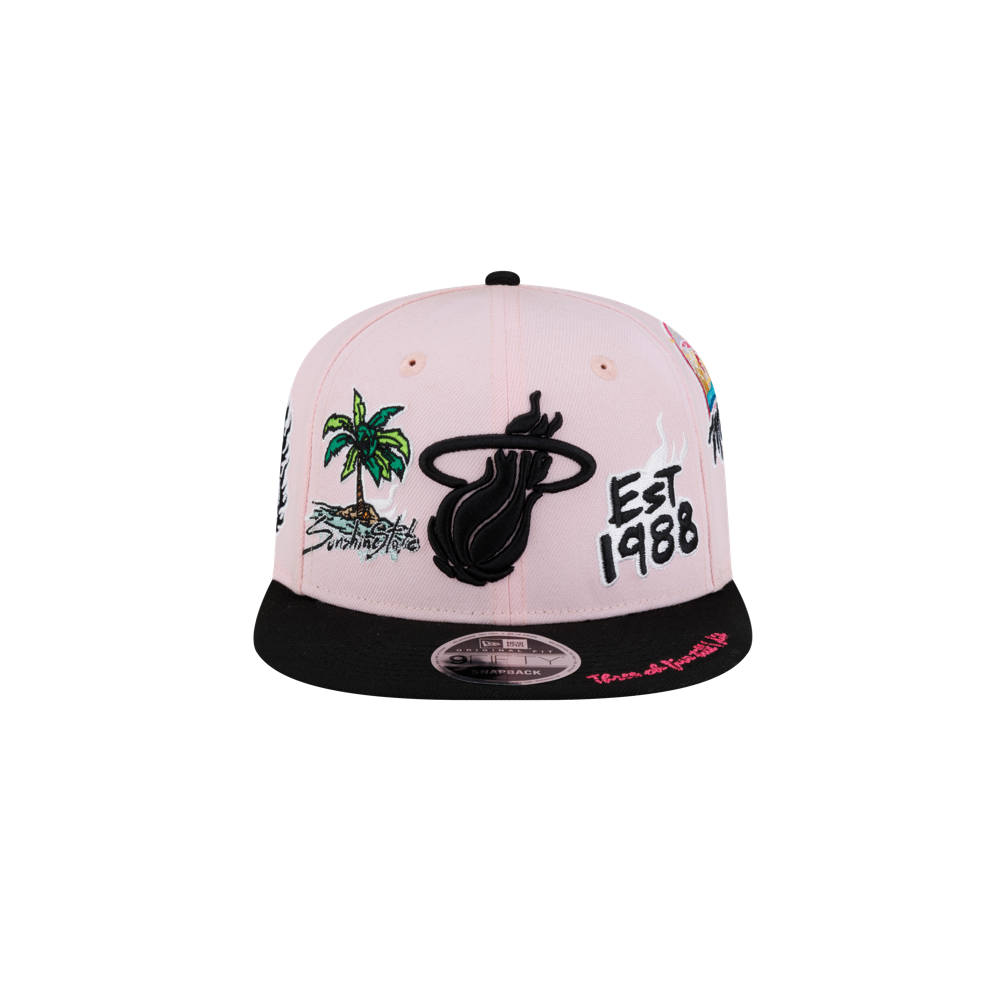 The Court Culture Original Vice Patch Snapback by Court Culture features a light pink and black polyester construction with a slim crown and various embroidered designs, such as palm trees, “EST 1988,” and a stylized logo on the front. Its squared visor is black with pink text on the side.
