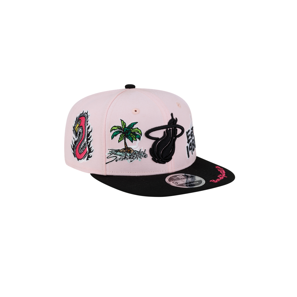 Introducing the Court Culture Original Vice Patch Snapback by Court Culture—a light pink and black polyester hat featuring a slim crown and bold, embroidered designs such as a palm tree, flame-inspired emblem, and vibrant patches on the front and side panels. This snapback is finished with a modern squared visor for contemporary style.