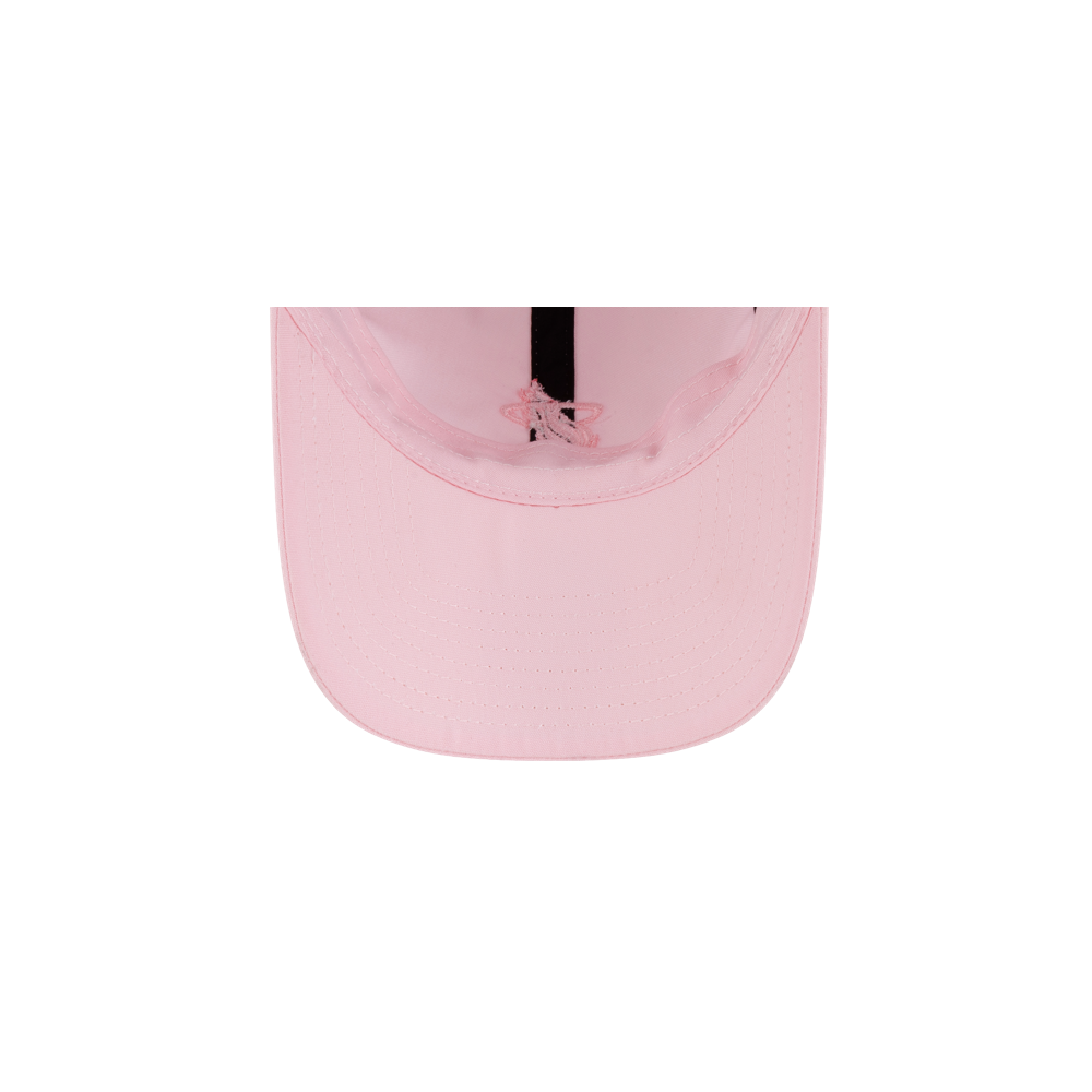Inside view of a light pink polyester Court Culture x New Era Breast Cancer Awareness Dad Hat, showing a small pink logo embroidered on the front panel.