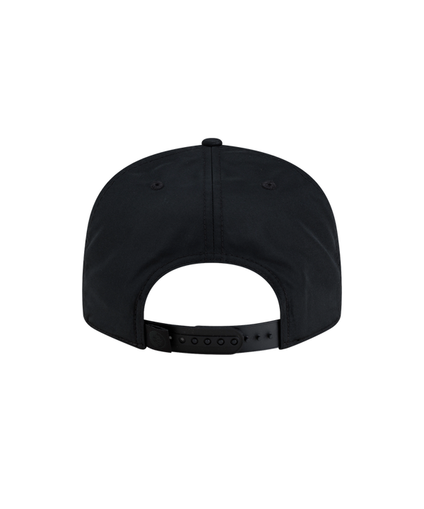Court Culture x New Era Blackout Snapback hat in black, featuring a matching black Miami Heat logo on the front and a circular sticker on the flat brim.