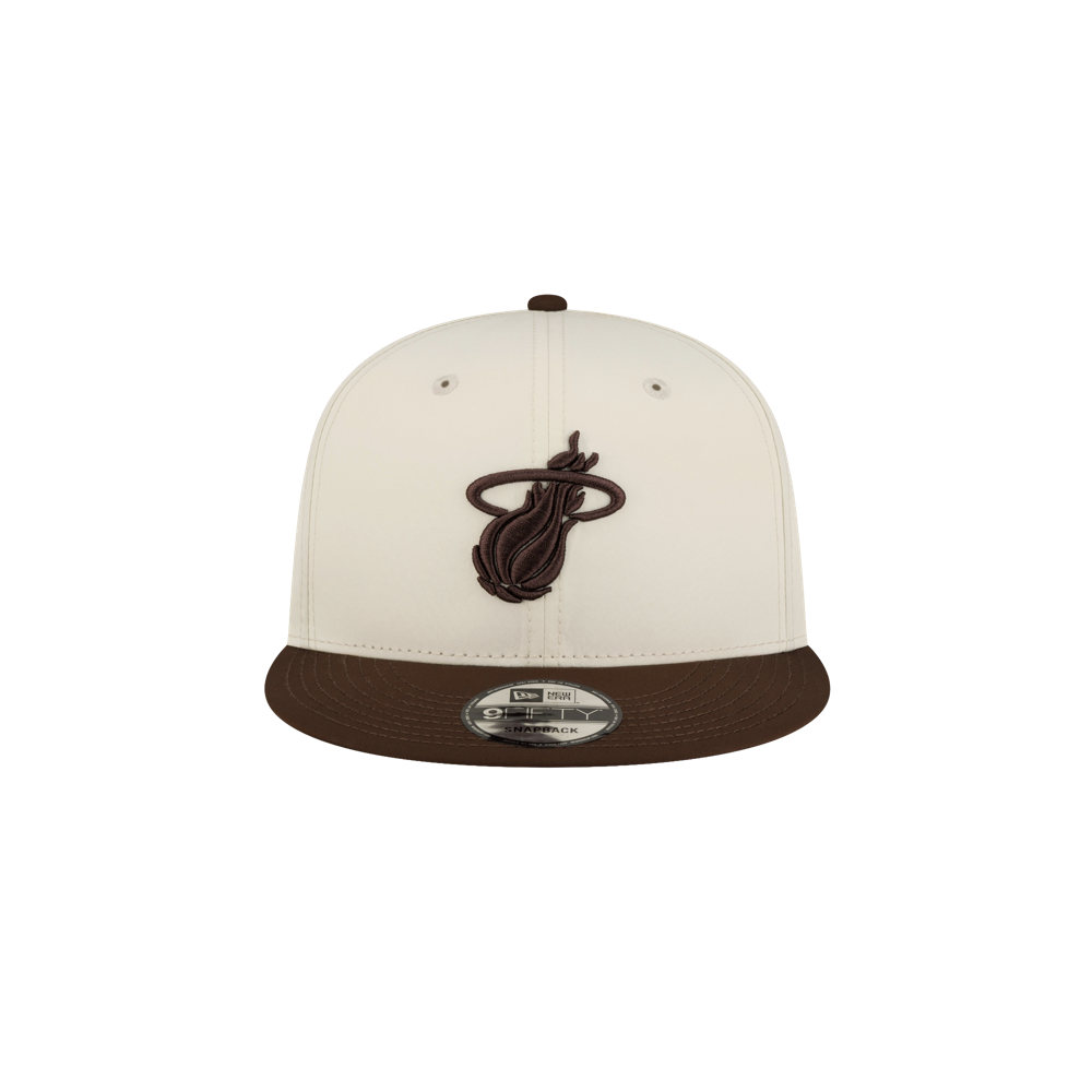 Court Culture x New Era Café y Leche snapback cap in off-white polyester with a dark brown brim and a dark brown Miami Heat logo on the front.