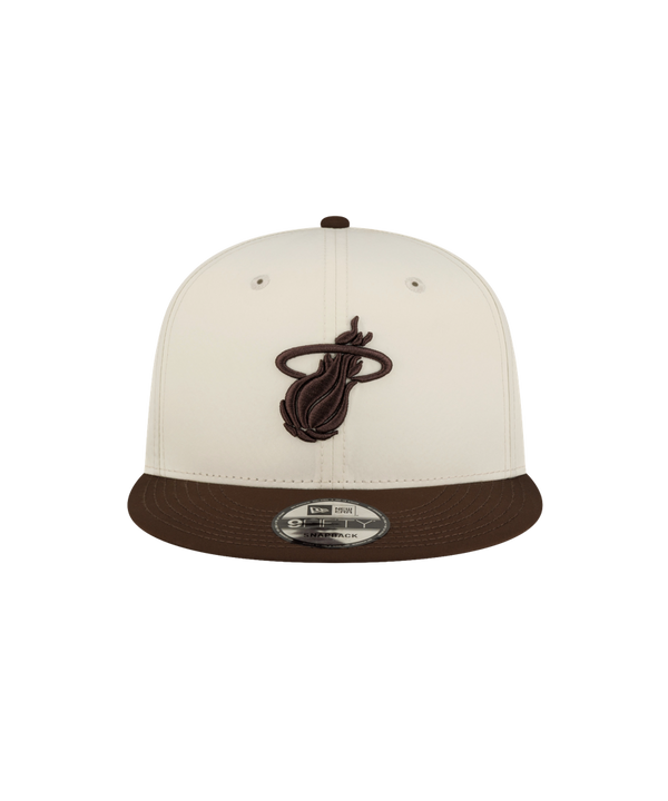 Court Culture x New Era Café y Leche snapback cap in off-white polyester with a dark brown brim and a dark brown Miami Heat logo on the front.