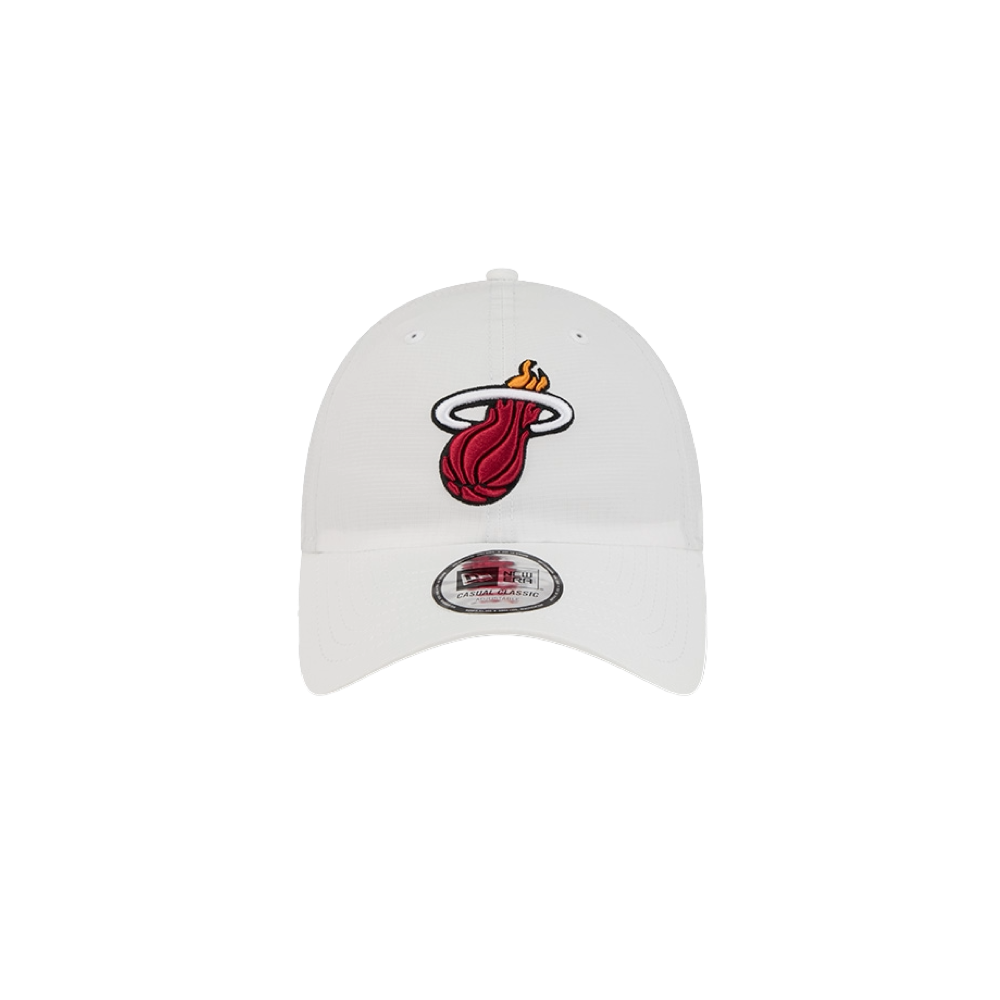 The New Era Miami HEAT Ripstop Dad Hat is a white polyester cap with the team logo on front and a silver sticker on the brim. One size fits most; spot clean only.