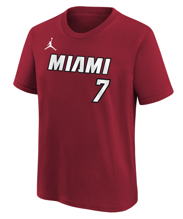 The Nike Giannis Antetokounmpo Jordan Brand Statement Red Name & Number Youth Tee features “MIAMI” and the number 7 in bold white and black text across the front, with a signature white Jumpman logo on the right shoulder. Made from comfortable cotton in a standard fit, this tee is machine washable for easy care.