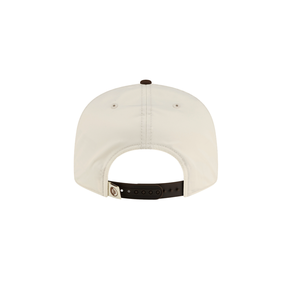 Back view of a cream-colored polyester Court Culture x New Era Café y Leche Snapback, featuring a dark brown adjustable snapback closure.