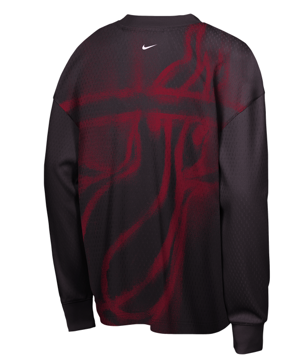 Certainly! Here’s the rewritten sentence using your product data: The Nike Miami HEAT Standard Issue Logo Game Long Sleeve Youth Tee features “Miami Heat Basketball” and the team logo printed in white on the chest. Made from soft, textured polyester, this black long-sleeve tee offers a relaxed, standard fit for all-day comfort. For best results, tumble dry low to help maintain quality.