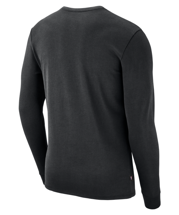 Here is a revision of your sentence using the provided product data: The Nike Miami HEAT 2026-27 Black Long Sleeve Practice Tee is a black, long-sleeve Nike shirt made from midweight cotton with a standard fit, featuring a small white Nike logo and text on the chest, displayed on a plain white background.