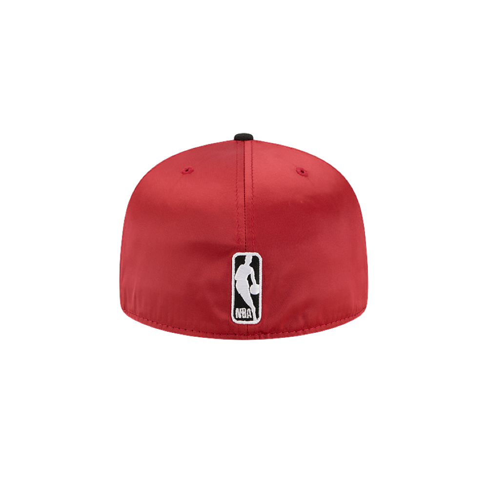 The New Era Miami HEAT Red Satin Fitted Hat, shown from the back against a plain white background, features a black and white NBA logo patch above the bottom edge. Spot clean only to keep its fresh look.