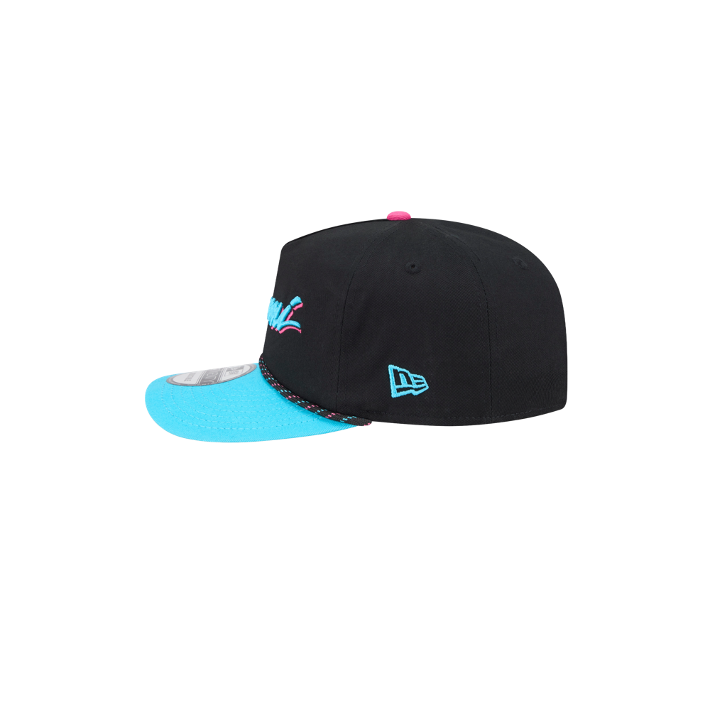 The New Era Miami HEAT Original Vice Nights Rope Snapback features black cotton, a bright blue flat brim, pink top details, and a blue stitched side logo. One size fits most. Shown from the side on a white background. Spot clean only.