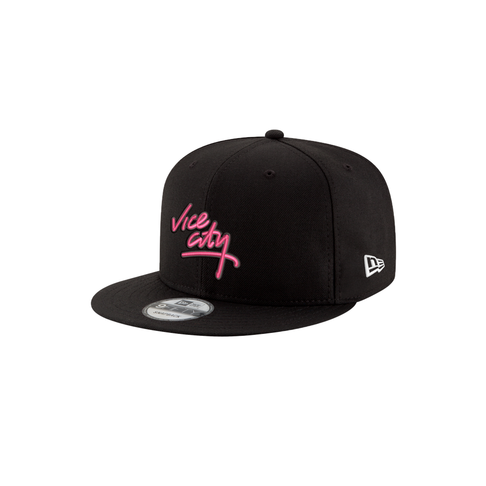 The Court Culture x New Era Vice City Logo Snapback is a black polyester hat featuring Vice City in pink script on the front and a white side logo. It’s one size fits most and shown on a plain white background.