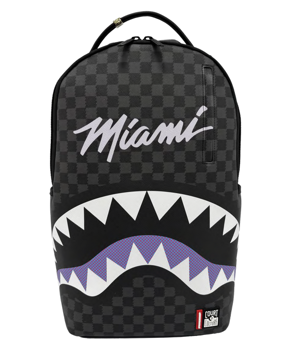 Introducing the Court Culture x Sprayground Miami HEAT Script Leather Backpack by Sprayground: This limited edition backpack showcases a black checkered design with “Miami” written in script at the top and a striking stylized shark mouth graphic in white, black, and purple on the front. For added functionality, it also features a laptop compartment for convenient organization.