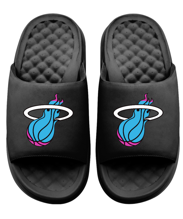 Step into comfort with ISlide Miami HEAT Original Vice Nights Logo Sandals, featuring cushioned soles, a massaging footbed, and straps adorned with a blue basketball, pink accents, and the white flaming hoop logo.
