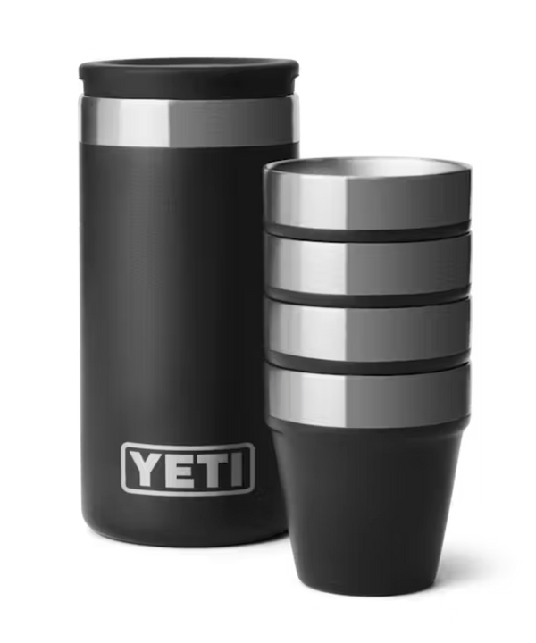 The Yeti Miami HEAT Shot Glass Set features black tumblers with a silver Miami Heat logo, stainless steel rims, and insulation like premium stainless steel shot glasses.