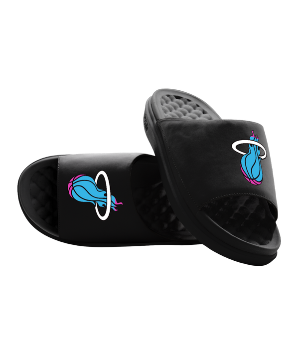 Step into comfort with ISlide Miami HEAT Original Vice Nights Logo Sandals, featuring cushioned soles, a massaging footbed, and straps adorned with a blue basketball, pink accents, and the white flaming hoop logo.