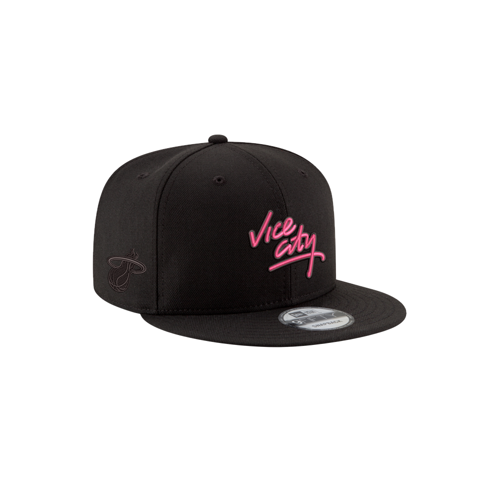 The Court Culture x New Era Vice City Logo Snapback is a black polyester hat with Vice City in pink script on the front, a small Miami Heat logo on the side; one size fits most. Spot clean only. Shown on a white background.