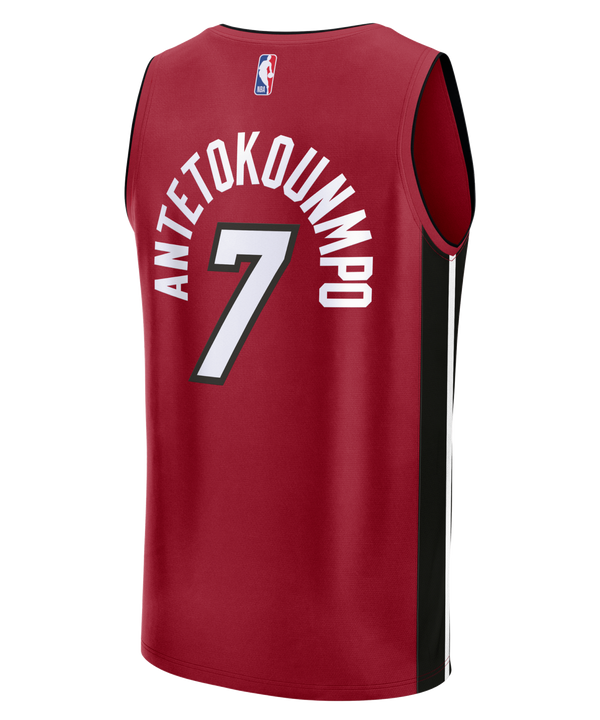 Showcasing the Giannis Antetokounmpo Miami HEAT Statement Red Replica Jersey by Fanatics, this sleeveless red basketball jersey features striking black side panels, bold white MIAMI lettering, and the number 7 on the front. Authentic NBA and Nike logos are visible at the neckline and bottom hem for a genuine touch. Modeled after Giannis Antetokounmpo’s style, it’s presented against a plain background—making it an ideal choice for dedicated Miami HEAT fans.