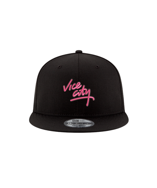 The Court Culture x New Era Vice City Logo Snapback features pink Vice City embroidery on black polyester. One size fits most. Displayed upright on a white background. Spot clean only.