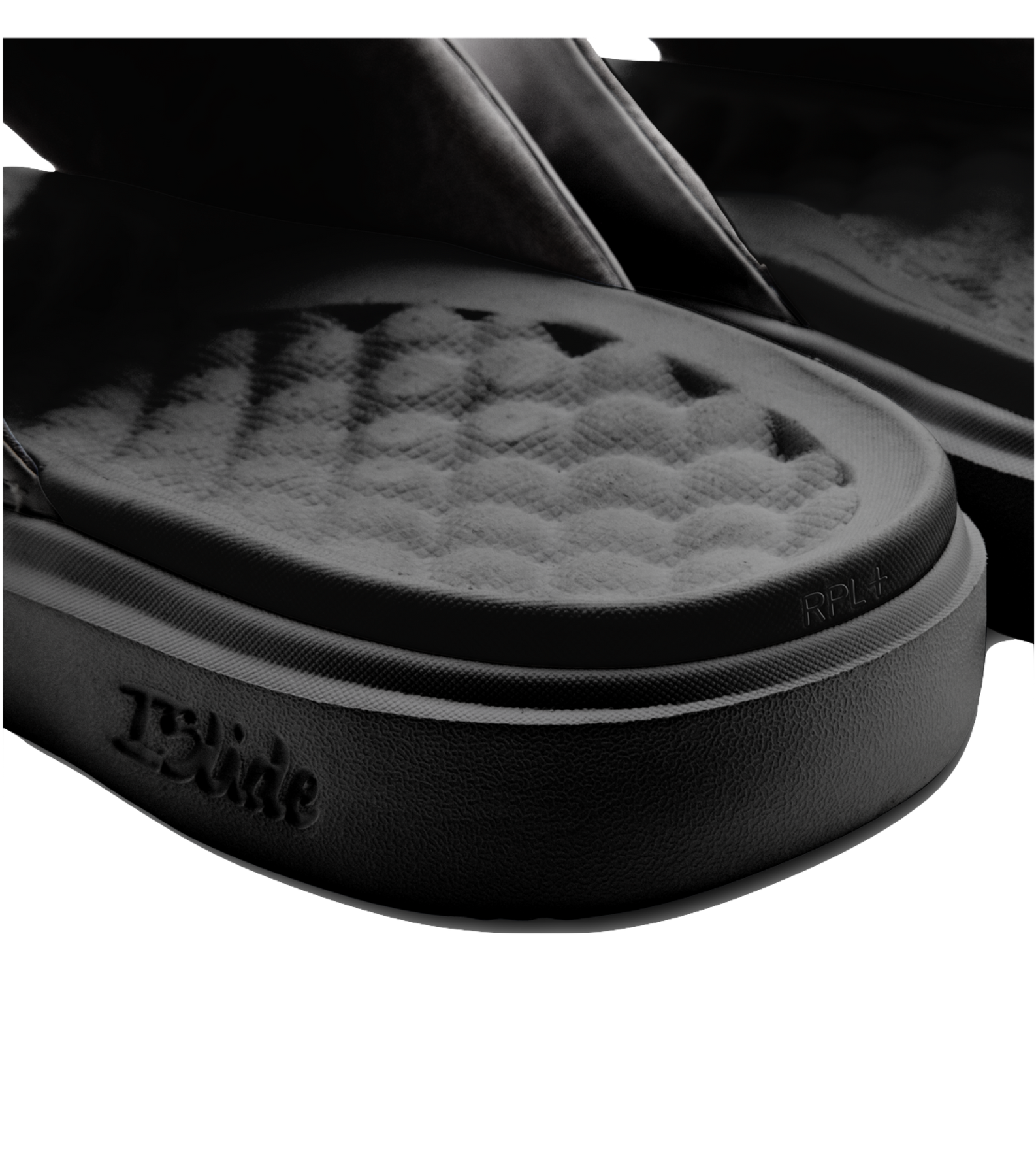 Close-up of the sole of ISlide Miami HEAT Original Vice Nights Logo Sandals by ISlide, showing a textured massaging footbed with RPL+ technology and 13Slide and RPLY branding on the side, set against a white background.