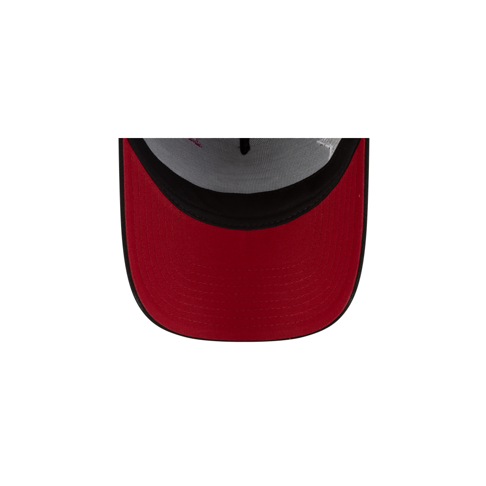 A close-up, top-down view of the brim of a New Era Miami HEAT Stardom Women's Hat in red with black trim, set against a plain white background.